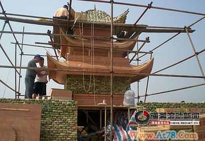 湖南用5.5万个粽子筑成5米高岳阳楼模型(组图)