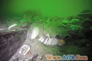 南澳1号古沉船发现铜锣骰子等物品(组图)