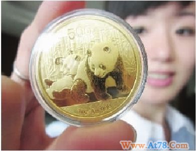 熊猫金币价格看现货金脸色 金价回落金币受热捧